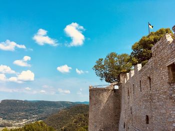 Low angle view of fort against sky