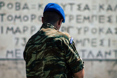 Rear view of man standing outdoors