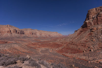 Scenic view of grand canyon national park against blue sky