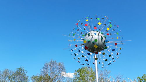Low angle view of plant against blue sky