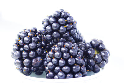 Close-up of fruits on white background