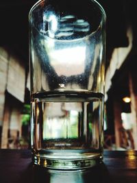 Close-up of beer glass on table