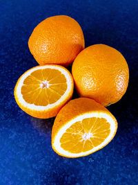 Close-up of oranges on table