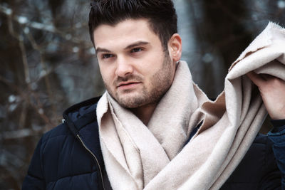 Portrait of young man in winter