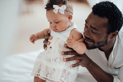 Father playing with daughter