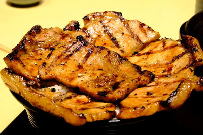 High angle view of meat on barbecue grill