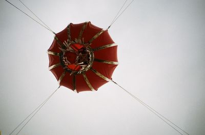 Low angle view of red wall