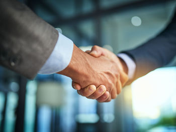 Cropped image of business colleagues shaking hands