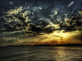 Scenic view of sea against sky at sunset