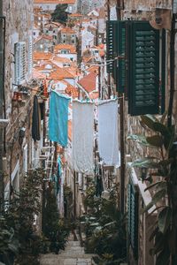 Clothes drying outside house