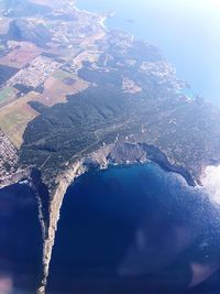 High angle view of sea and land
