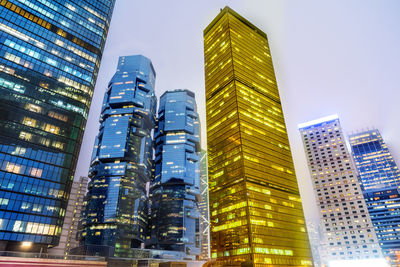 Low angle view of modern buildings against clear sky