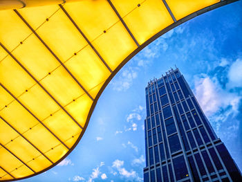 Low angle view of modern buildings against sky