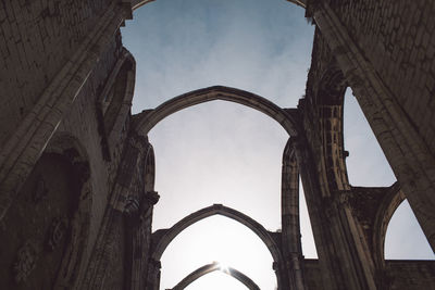 Low angle view of old ruin historical building against sky