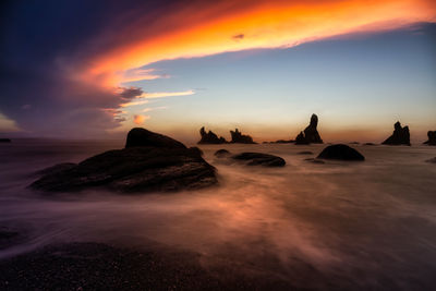 Scenic view of sea against sky during sunset