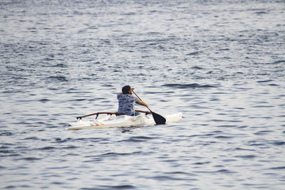 Man swimming in sea