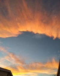 Low angle view of dramatic sky during sunset