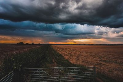 Scenic view of landscape against sky during sunset