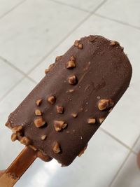 Vanilla ice cream with chocolate and peanut during sunny day its actually real heaven