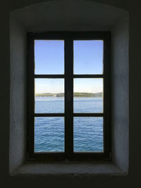 Sea seen through window