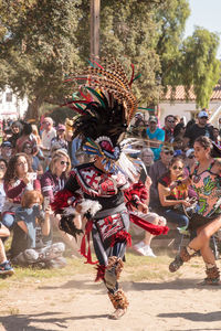 People in traditional clothing during festival