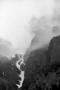 Scenic view of mountains against sky during winter