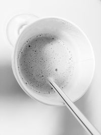 High angle view of coffee cup on table