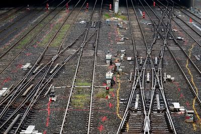 High angle view of train on railroad tracks in city