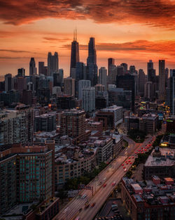 High angle view of city at sunset