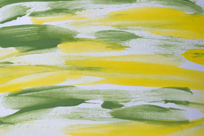 Close-up of yellow painted paper