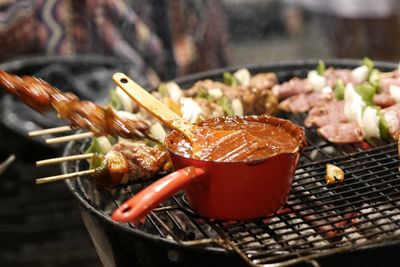 Close-up of meat on barbecue grill