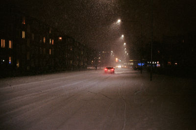 Cars on road at night