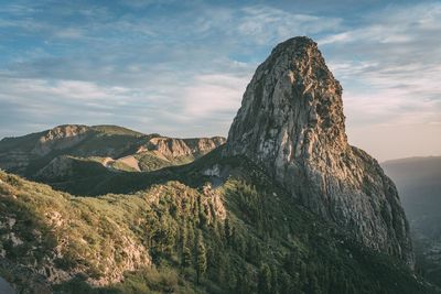 Panoramic view of rock formation against sky