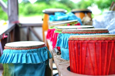 Row of drums at market stall