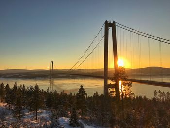 View of suspension bridge during sunset