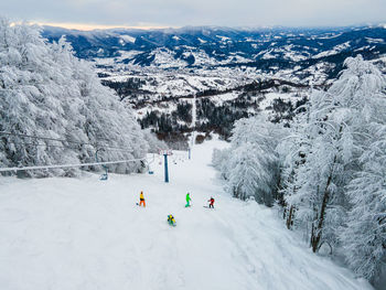Scenic view of snow covered mountains