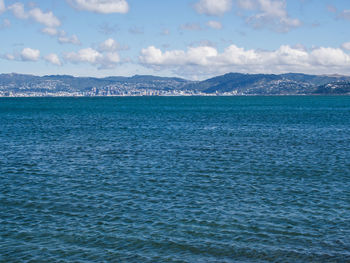 Scenic view of sea against cloudy sky