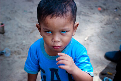 Portrait of cute boy looking away