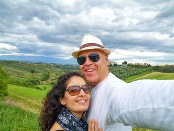 Selfie of couple in green countryside