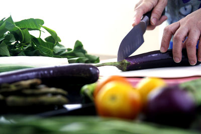 Close-up of man preparing food