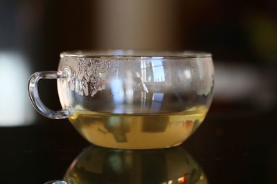 Close-up of tea in glass on table