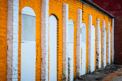 Built structure against brick wall