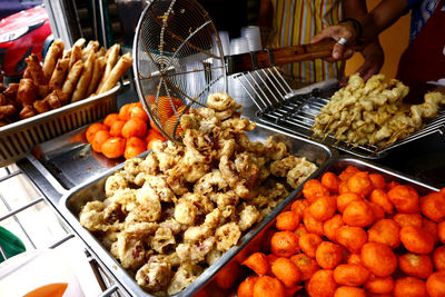 Variety of food for sale at market stall