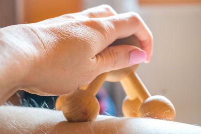 Cropped hand of woman holding hands