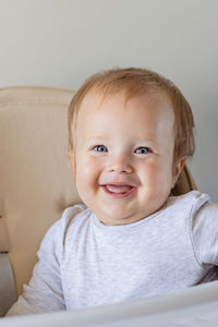 Portrait of cute caucasian baby girl at home