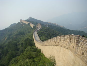 High angle view of castle on mountain against sky