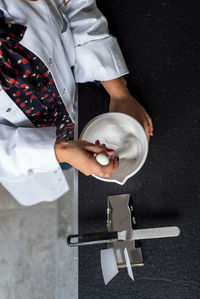 Close-up of man holding ice cream