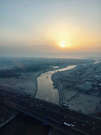 High angle view of cityscape against sky during sunset