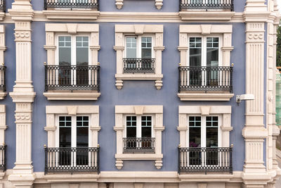 Serene balcony with lush greenery overlooking charming streets in lugo, spain