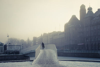 View of woman in city